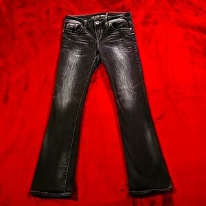 Woman's Guess Premium Jeans ,size 32, in black